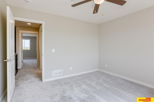 3593 Little Bluestem Rd, Fremont, NE 68025 - unfurnished room with ceiling fan and light carpet