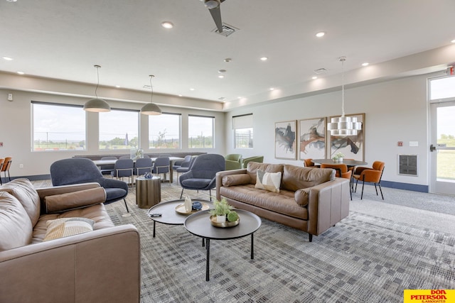 3593 Little Bluestem Rd, Fremont, NE 68025 - living room featuring recessed lighting, healthy amount of natural light, and light colored carpet