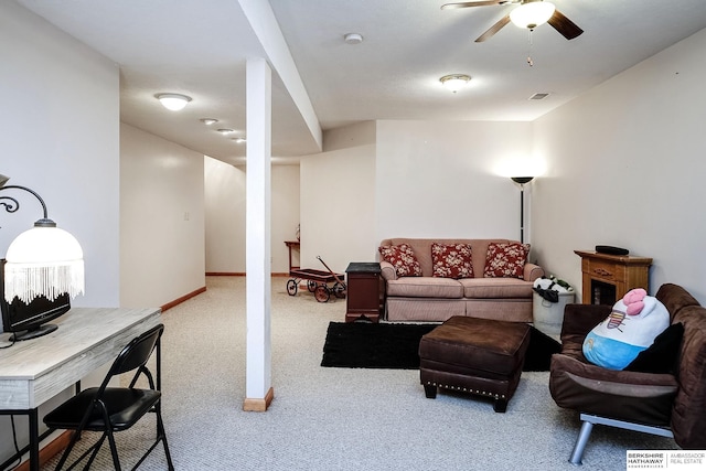 living room with visible vents, ceiling fan, baseboards, and carpet floors