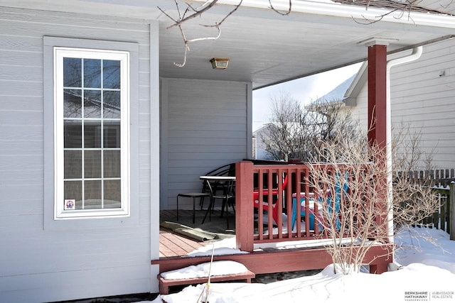 view of snow covered deck