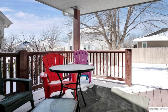 view of snow covered deck