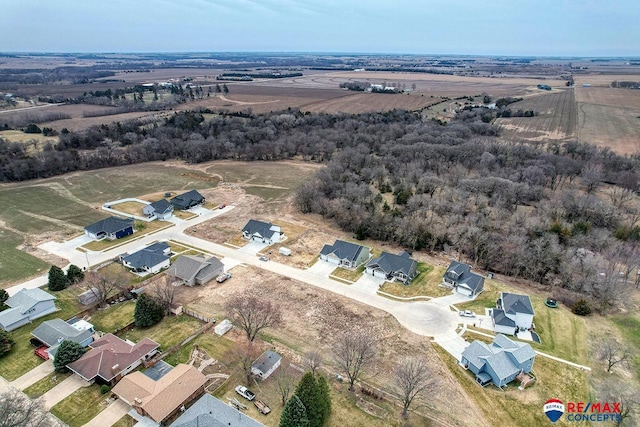 aerial view featuring a residential view and a rural view