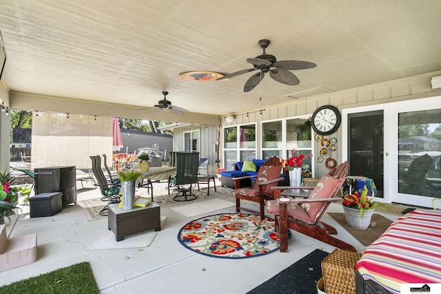 view of patio / terrace featuring outdoor dining area and a ceiling fan