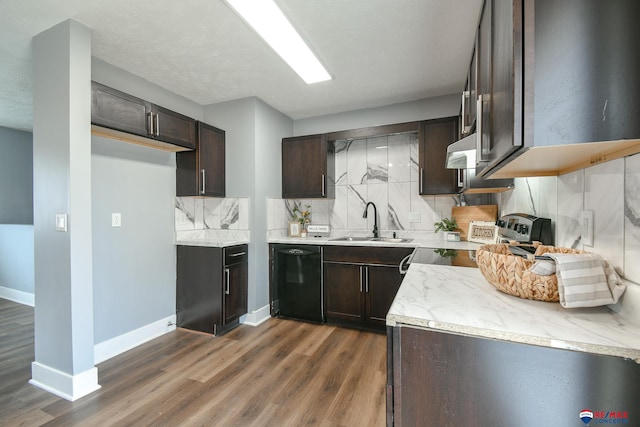 kitchen featuring baseboards, decorative backsplash, electric stove, dark wood-style flooring, and a sink