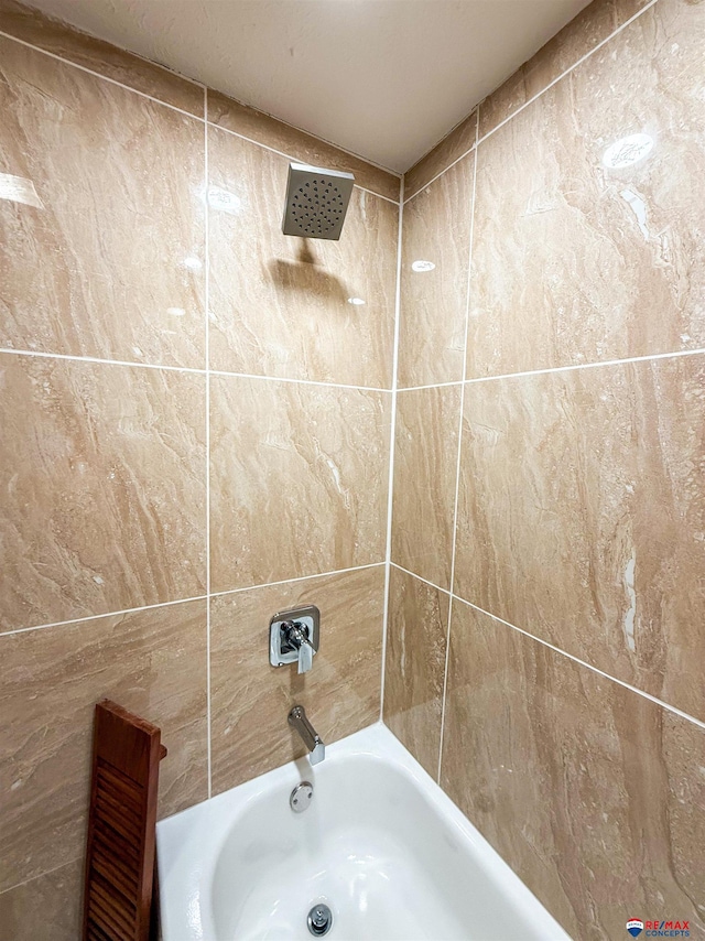 bathroom featuring tub / shower combination