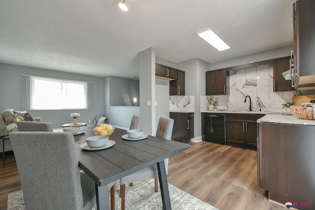 dining space featuring wood finished floors