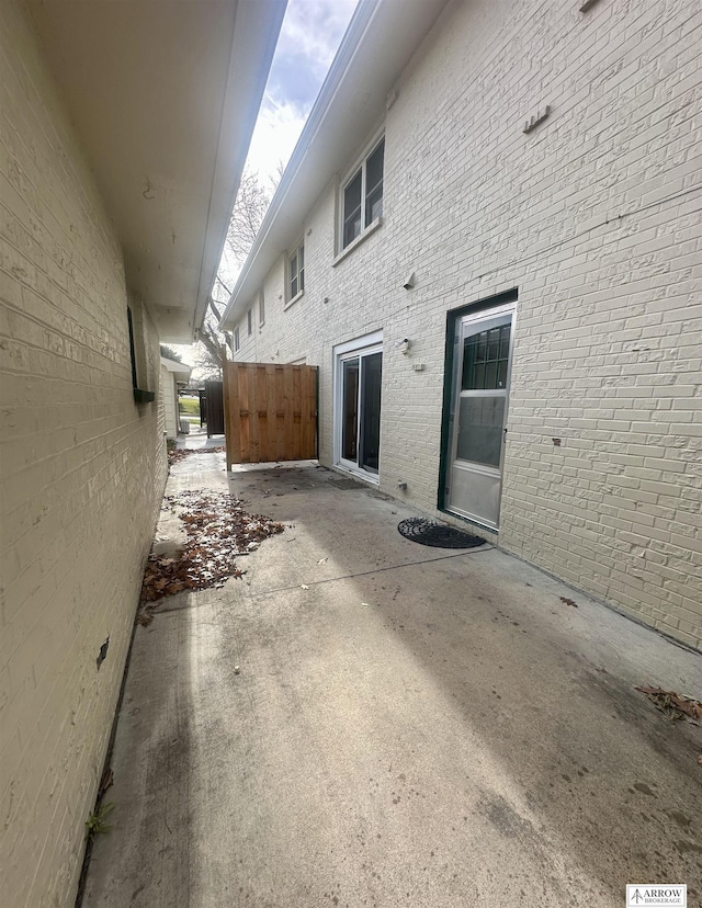 exterior space featuring fence and a patio