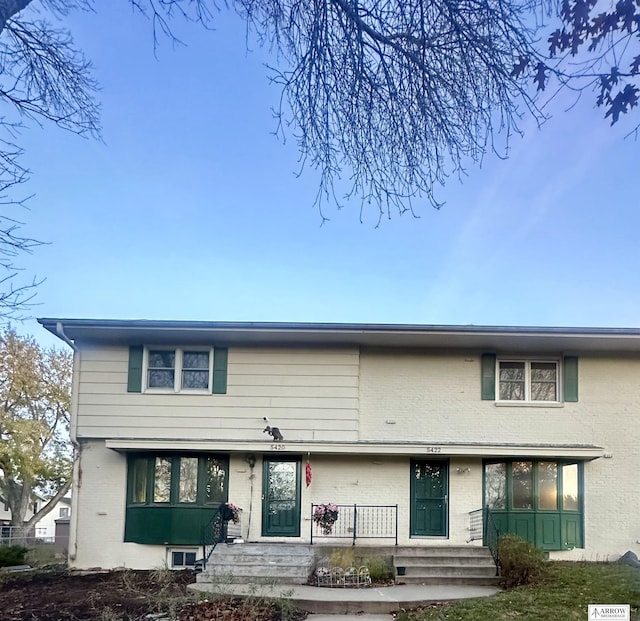 view of front of property with brick siding