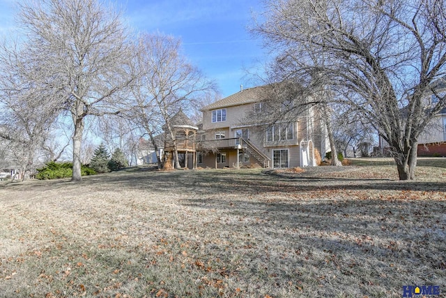 view of front of house with a deck and stairs