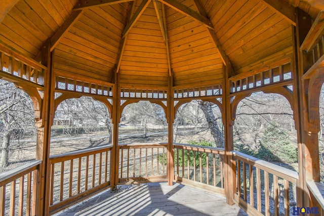 wooden deck featuring a gazebo and covered porch