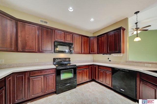 kitchen featuring visible vents, pendant lighting, light countertops, recessed lighting, and black appliances