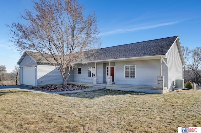 ranch-style home with a garage, a porch, cooling unit, and a front lawn