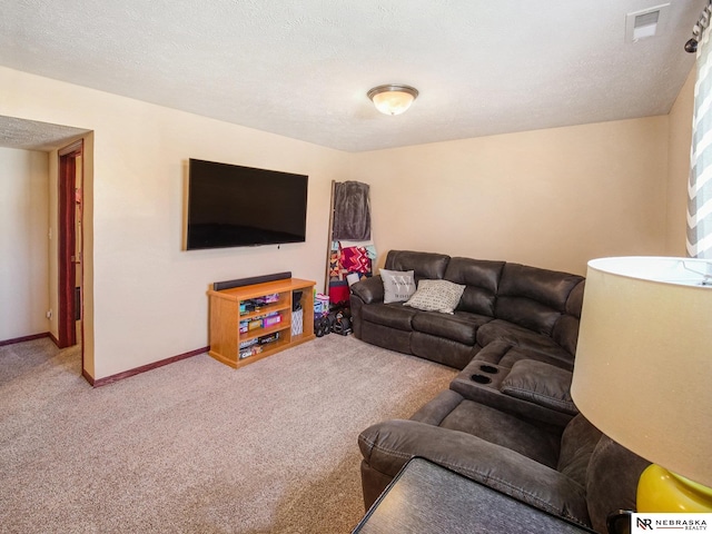 living room with carpet floors, baseboards, and visible vents