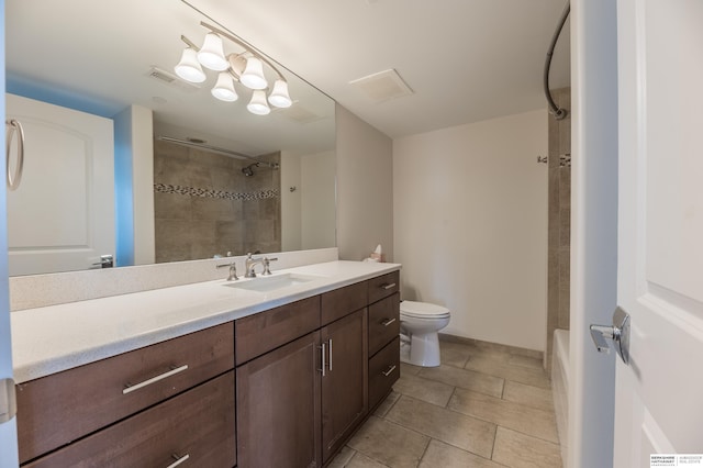 bathroom with visible vents, toilet, tile patterned floors, walk in shower, and vanity