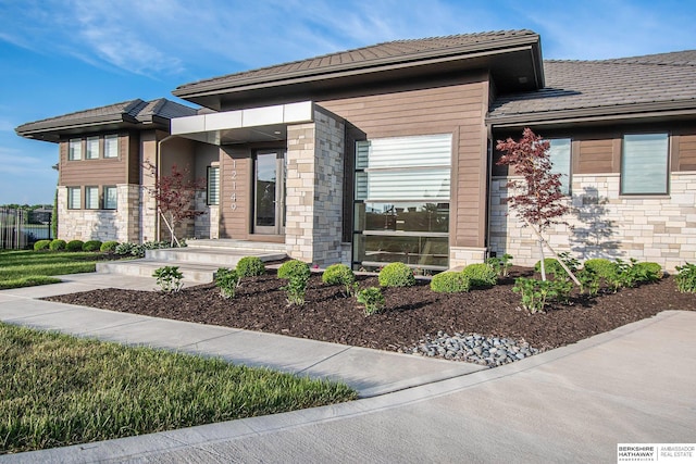 view of front of property with stone siding