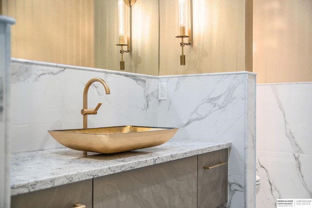 bathroom featuring visible vents and vanity