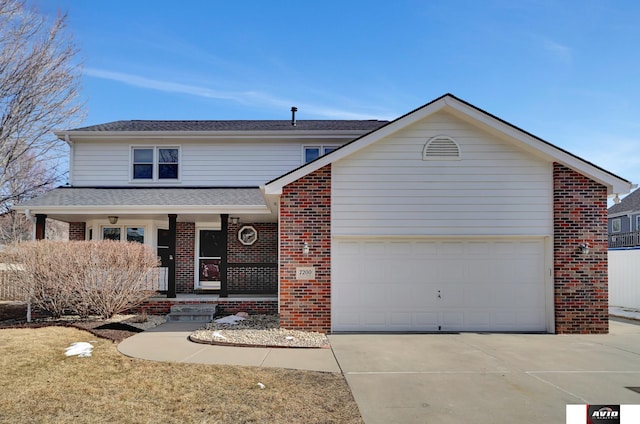 view of front of house featuring covered porch, driveway, brick siding, and an attached garage