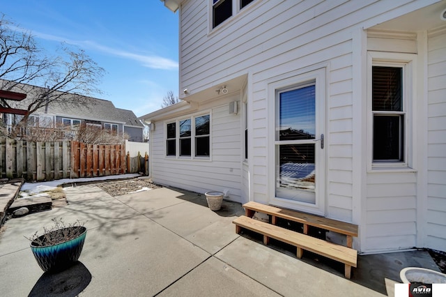 view of patio / terrace with entry steps and fence