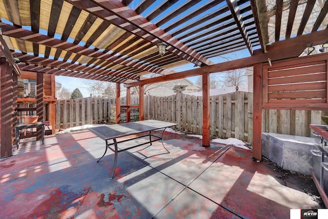 view of patio featuring fence and a pergola