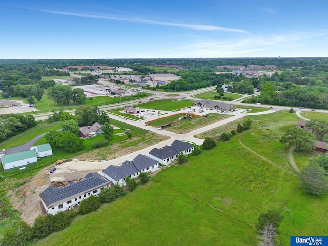 birds eye view of property with a residential view