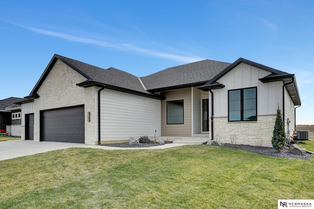 view of front of house with a garage, stone siding, board and batten siding, and cooling unit