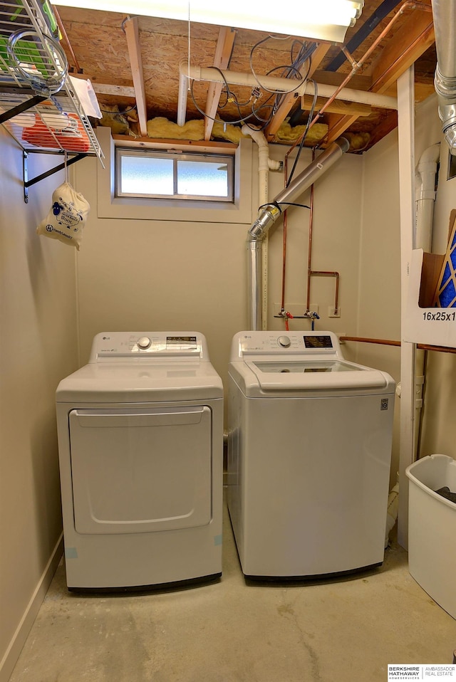 laundry area featuring laundry area and washer and dryer