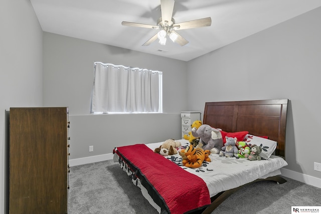 bedroom featuring light carpet, ceiling fan, and baseboards