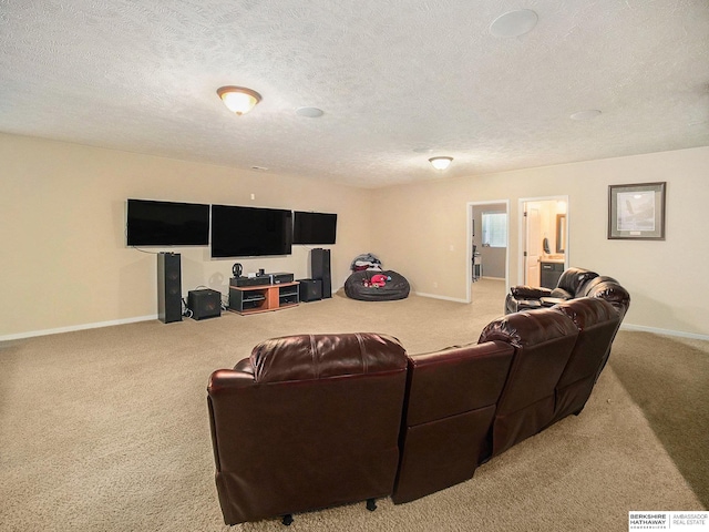 living area featuring a textured ceiling, carpet floors, and baseboards