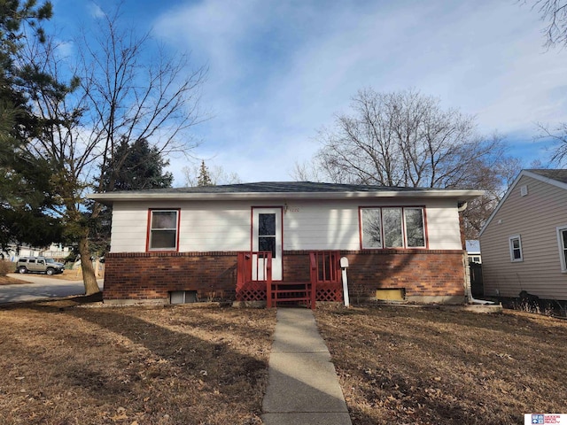 view of front of property featuring brick siding