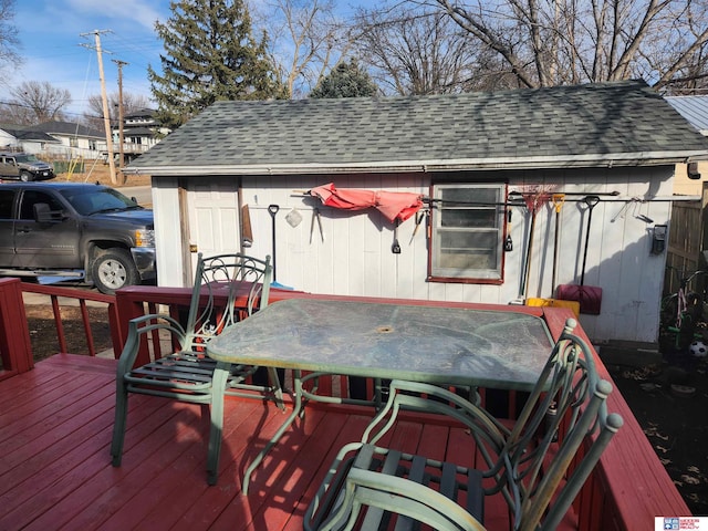 wooden deck with outdoor dining area