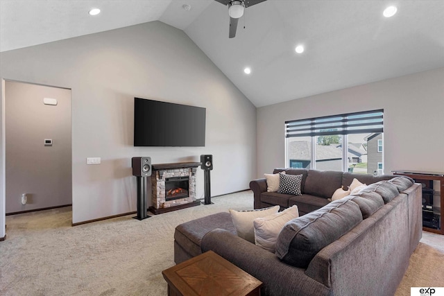 living room featuring recessed lighting, a ceiling fan, light carpet, a stone fireplace, and baseboards