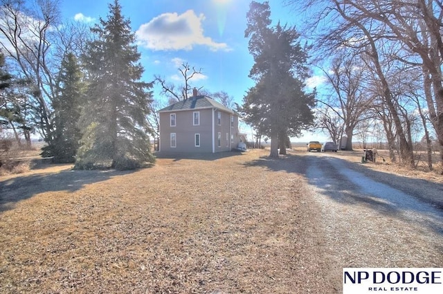 exterior space featuring driveway