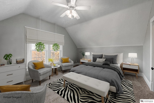 bedroom with baseboards, lofted ceiling, ceiling fan, carpet, and a textured ceiling