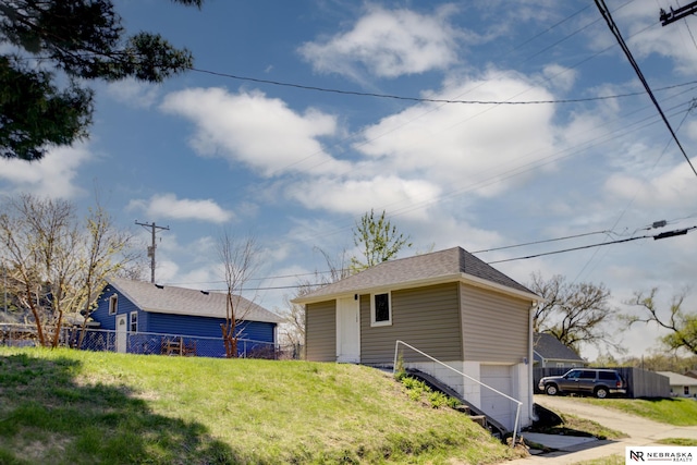 exterior space with a yard and fence