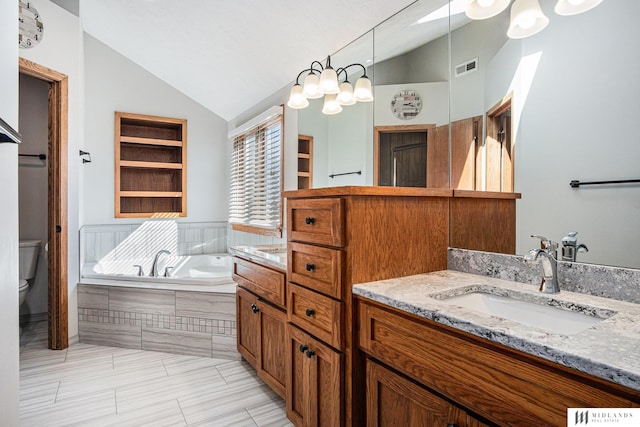 full bath with lofted ceiling, toilet, visible vents, vanity, and a bath