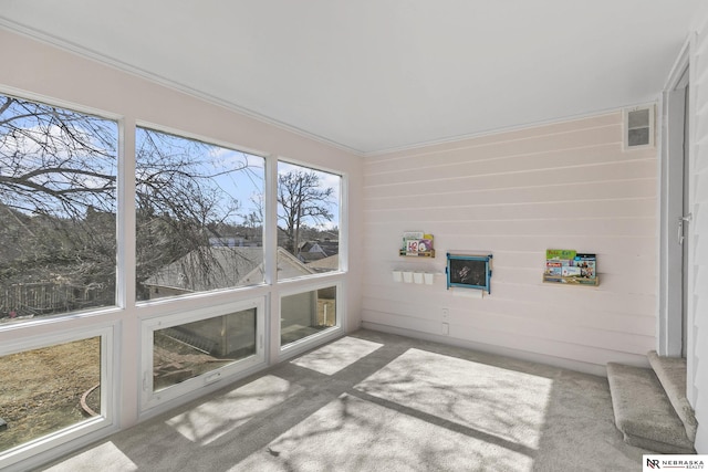 sunroom / solarium featuring visible vents