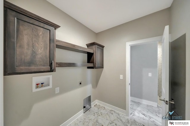 clothes washing area featuring washer hookup, marble finish floor, cabinet space, hookup for an electric dryer, and baseboards