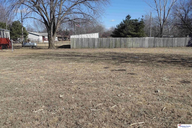 view of yard featuring fence