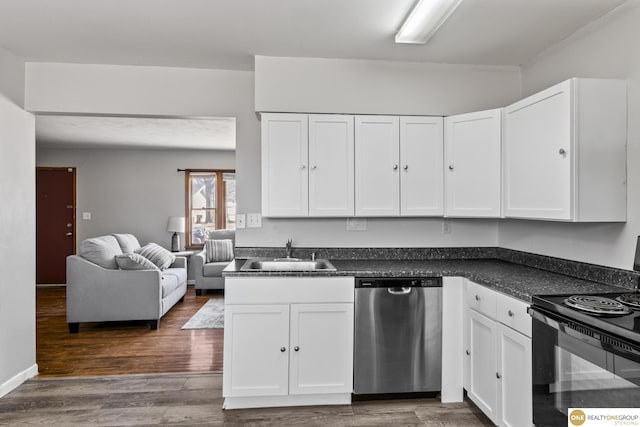 kitchen featuring dark countertops, open floor plan, a sink, dishwasher, and black / electric stove