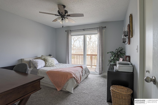 bedroom with a textured ceiling, access to outside, carpet, and a ceiling fan