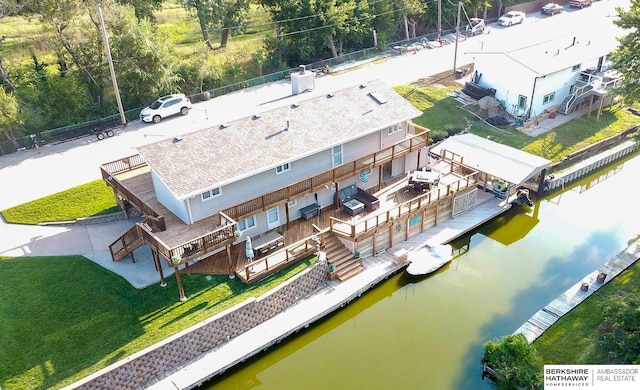 aerial view featuring a water view