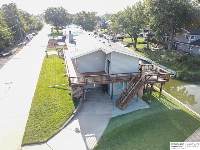 aerial view featuring a water view and a residential view