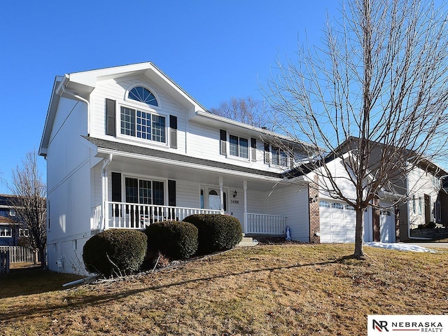 view of front of house featuring covered porch and an attached garage