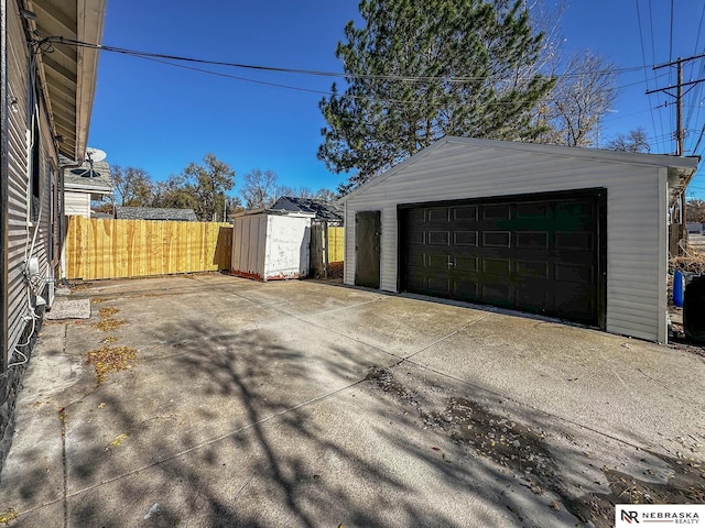 detached garage with fence