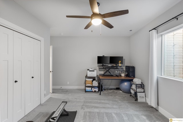 office featuring ceiling fan, carpet flooring, and baseboards