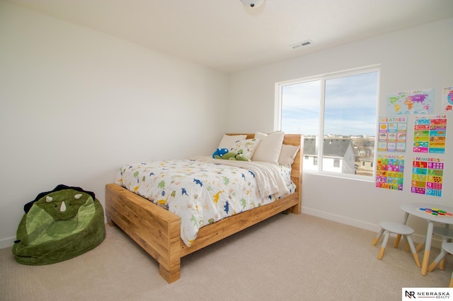 bedroom featuring carpet, visible vents, and baseboards