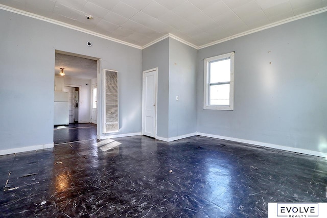 unfurnished room with crown molding and baseboards