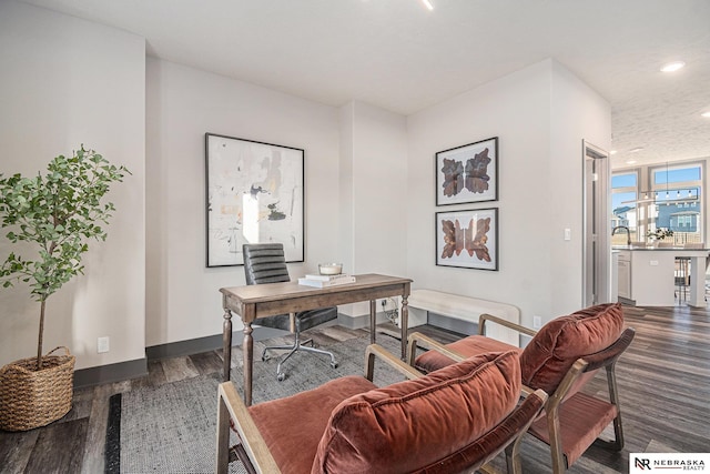 office space featuring recessed lighting, baseboards, and wood finished floors