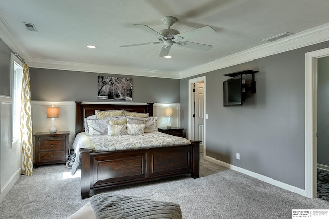 bedroom with visible vents, light colored carpet, and crown molding