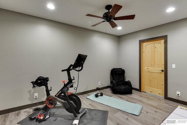 exercise room featuring recessed lighting, baseboards, light wood-style floors, and ceiling fan